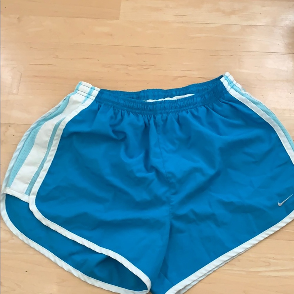 Blue striped nike running shorts